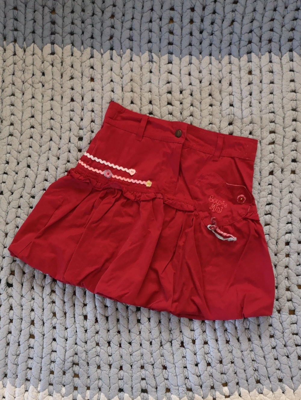 Red Mini Skirt with Ruffle Hem and Decorative Trim